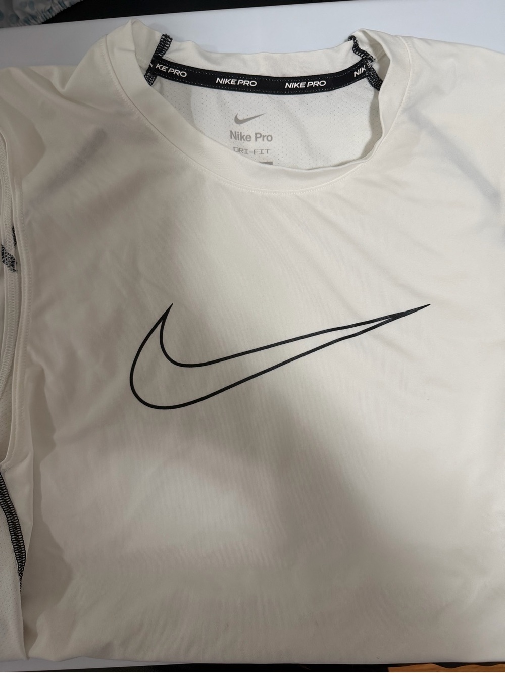 Nike Men's White Performance Dri-FIT Shirt with Black Swoosh